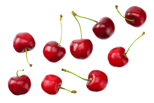 Красная вишня изолирована на белом фоне. Вид сверху
