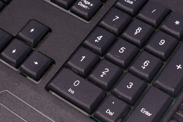 Black keyboard for messaging and writing text on a computer — Stock Photo, Image