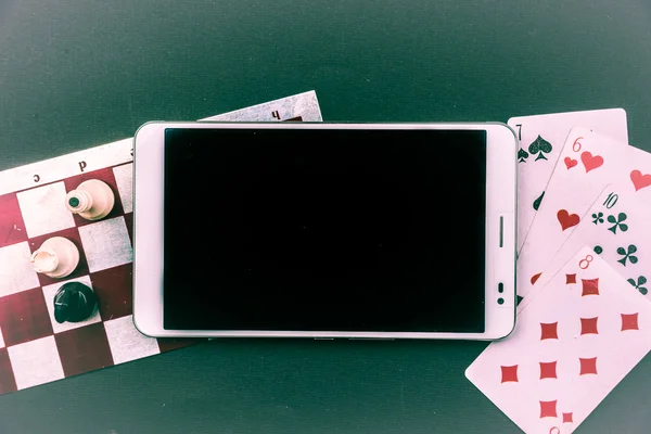 Vários jogos de tabuleiro com tablet pc . — Fotografia de Stock