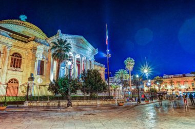 The evening view of Teatro Massimo - Opera and Ballet Theater in Verdi Square clipart