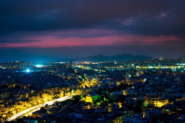 Atina Panorama adlı günbatımı. Güzel cityscape