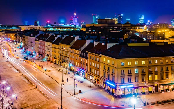Rua Krakowskie Przedmiescie à noite — Fotografia de Stock