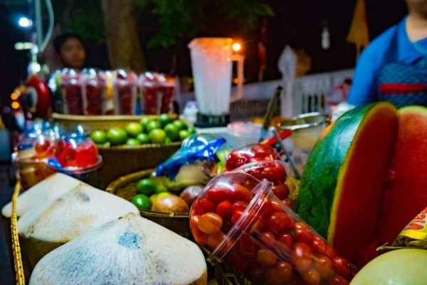 Ingredients for smoothie on street vendors table at night. — Stock Photo, Image