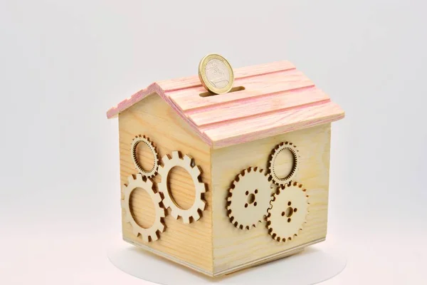 Wooden Miniature House Piggy Bank One Euro Coin Gears Facades — 图库照片