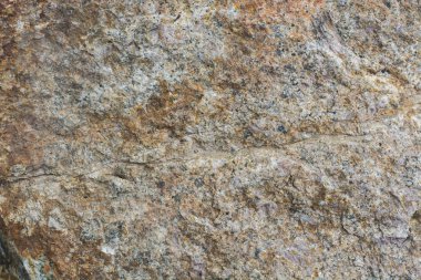 Kahverengi renkli mermerin yüzeyi.