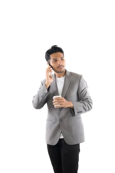 İşadamı hipster holding kahve ve telefon izole konuşma — Stok fotoğraf
