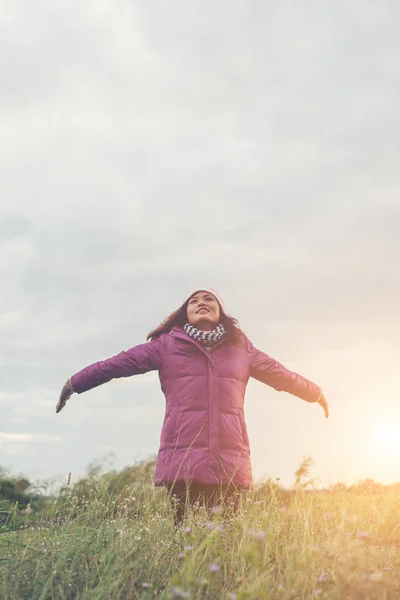 Silhouette of the woman freedom enjoy with fresh breeze while wi