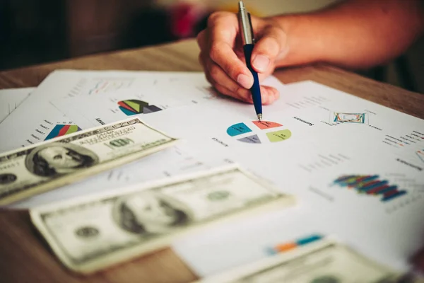 Working place of trader. The table covered by cash notes, keyboa — Stock Photo, Image