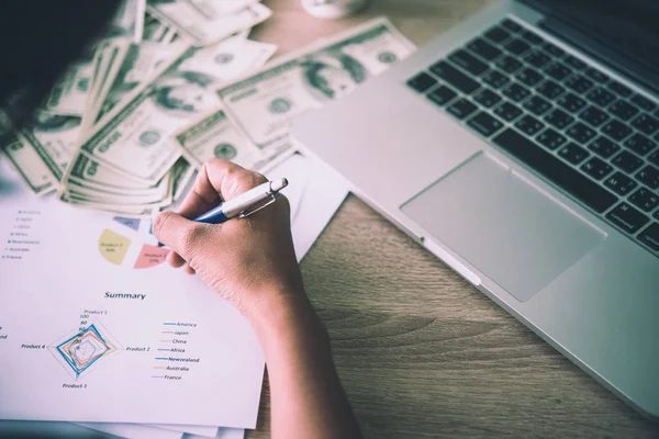 Working place of trader. The table covered by cash notes, keyboa — Stock Photo, Image