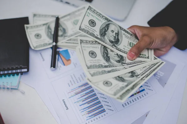 Business woman with dollars, close up sitting on her workplace w — Stock Photo, Image