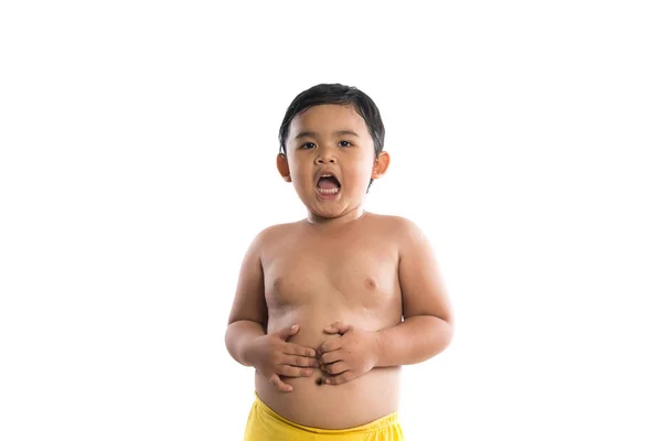 Menino com as mãos para cima brincalhão de pé no estúdio isolado em — Fotografia de Stock