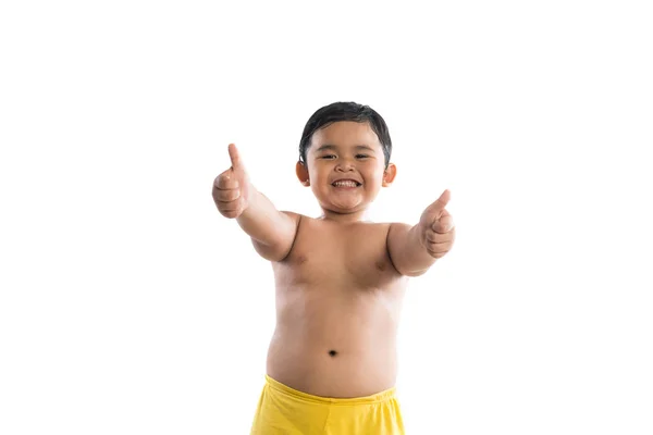 Menino posar retrato com o polegar no fundo branco. Crianças. — Fotografia de Stock