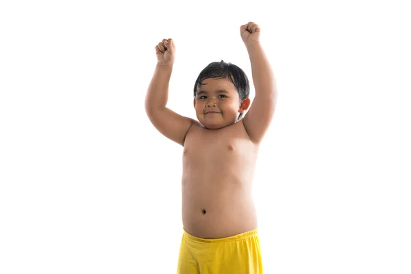Αστείο, μικρό αγόρι που παρουσιάζουν ισχυρή. bodybuilder. Προβολή του χέρι β — Φωτογραφία Αρχείου