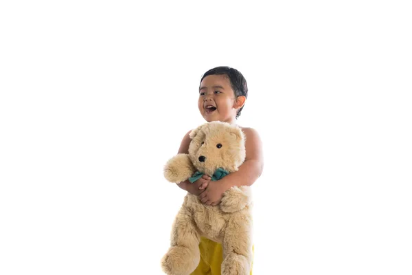 Little asian boy holding big teddy bear, isolated on white backg — Stock Photo, Image