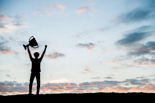 Silhouette Man Holding Gold Trophy Cup — Stock Photo, Image