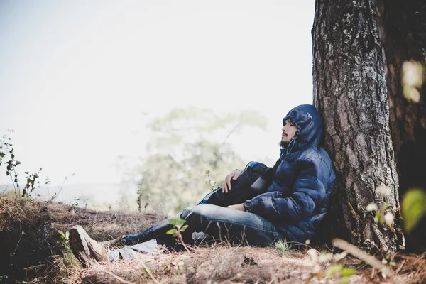 Portrait Young Beard Man Sitting Alone Tree Backpack Looking Away — Stock Photo, Image