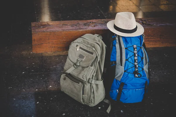 image of backpack in train station. Travel concept.