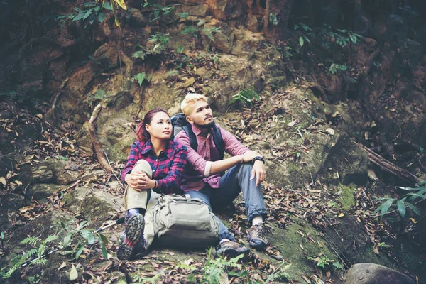 Young Tourist Couple Take Rest Waterfall While Hiking Forest Looking — Stock Photo, Image