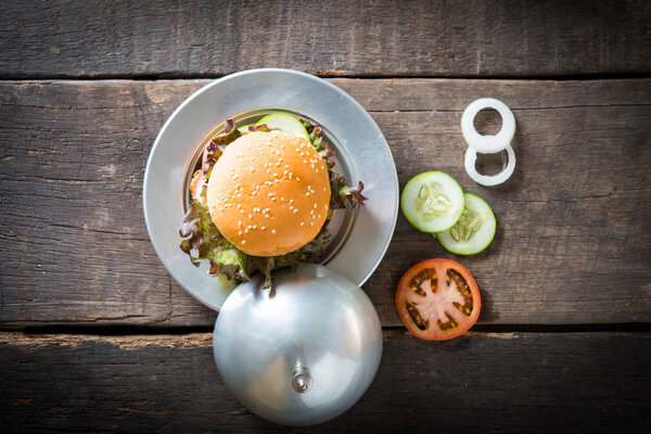Top view Rustic homemade hamburger.
