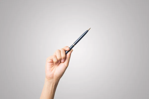 Woman hand with pens isolated on white background.