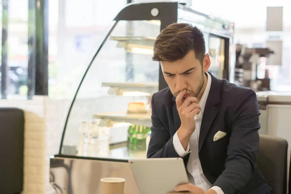 Curious Young Businessman Watching Something His Tablet — Stock Photo, Image