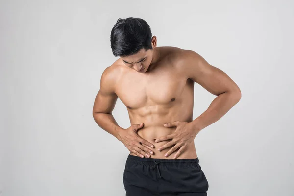 Young Handsome Muscular Man Has Abdominal Pain Isolated White Background — Stock Photo, Image