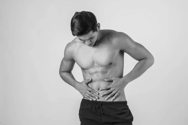 Jovem Bonito Homem Muscular Tem Dor Abdominal Isolada Fundo Branco — Fotografia de Stock