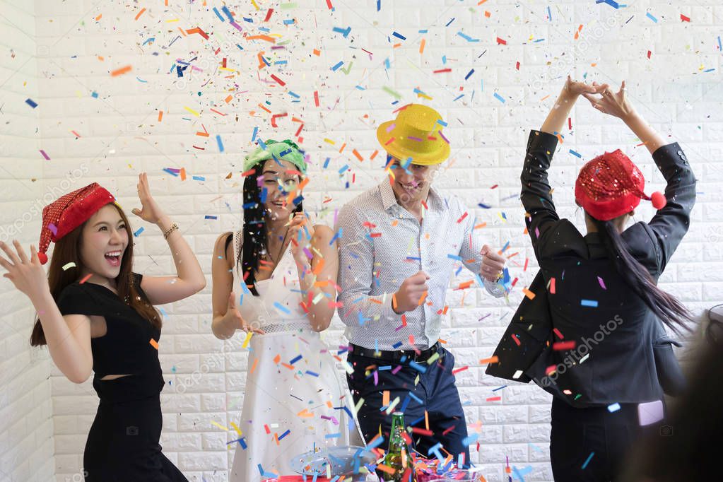 Happy business group people in santa hat having fun for celebrity christmas party.