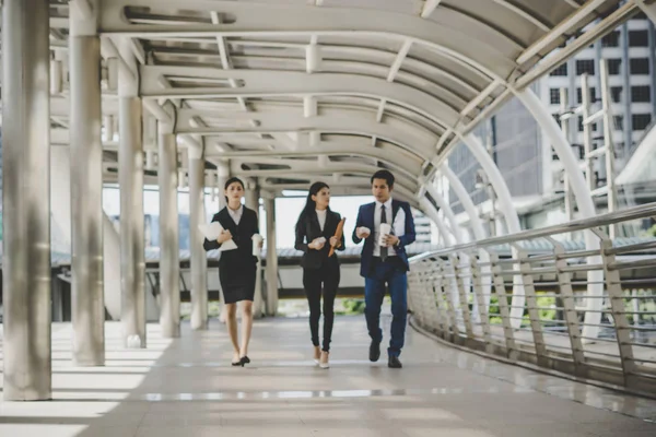 Blurred background Business people walking to go meeting in office.