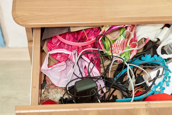 Trash, dirt, mess in the dresser drawer, different things. — Stock Photo, Image