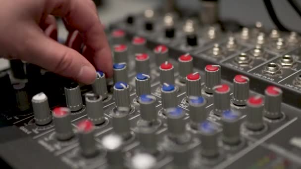 Sound control panel, toggle switches sound controls female hand turns the toggle — Stock Video