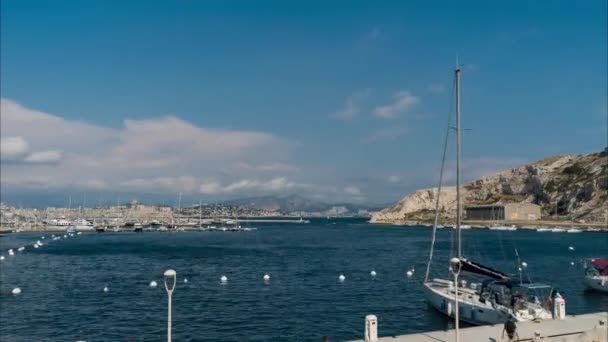 Yacht in the port against the backdrop of the sea of Marseille — Stock Video