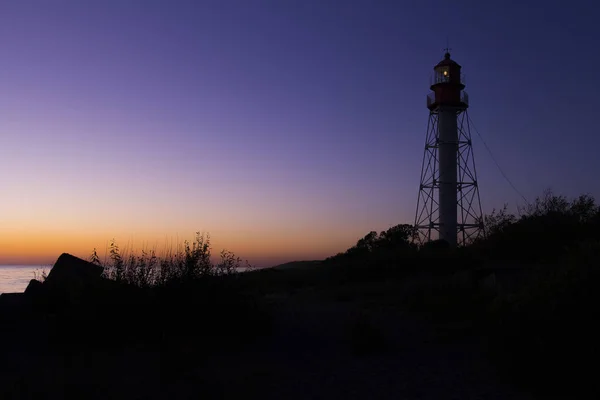 The Pape lighthouse in Latvia at sunset — Stock Photo, Image