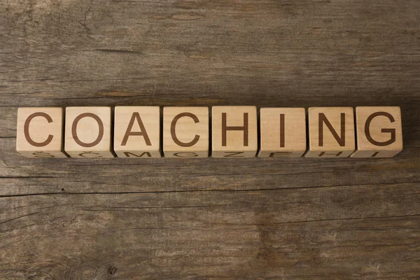 Coaching Word Written Wooden Toy Cubes — 스톡 사진