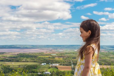 Little girl looking at Annapolis Valley clipart