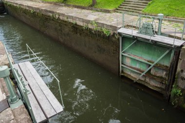 Neckar river watergate opening door