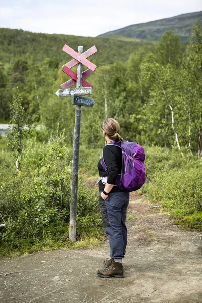 Hiking along the walking trail in Lappland