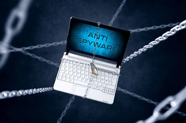 Chained laptop with "Anti Spyware" symbol. — Stock Photo, Image
