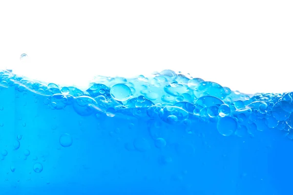 Blue water with bubbles on white background — Stock Photo, Image