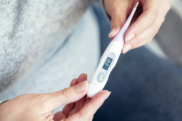 Woman Hands Hold Thermometer Shows High Body Temperature — Stock Photo, Image