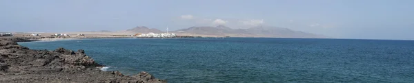 Fuerteventura, Kanarya Adaları, İspanya: Puerto de la Cruz, Punta de Jandia, aşırı Güney cape Morro Jable korumalı alanda Jandia Doğal Parkı içinde adanın en güney köyü havadan görünümü — Stok fotoğraf