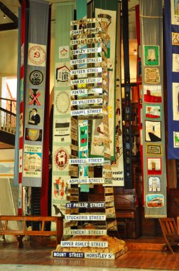 Cape Town, South Africa: the stack made with the old street signs of District Six before the forced removal of its inhabitants at the District Six Museum, the memorial of the events of the apartheid era (1948-early 1990s)  clipart
