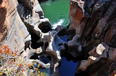 South Africa: aerial view of the potholes and plunge pools of the Truer River at the Bourke's Luck Potholes, a geological feature part of the Blyde River Canyon Nature Reserve, along the Panorama Route in the Mpumalanga province clipart