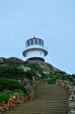 Table Mountain National Park, South Africa: view of the stone staircase to the old Cape Point Lighthouse, built on the Cape Point promontory in the late 1850s and closed after the sinking of the Lusitania in 1911 clipart