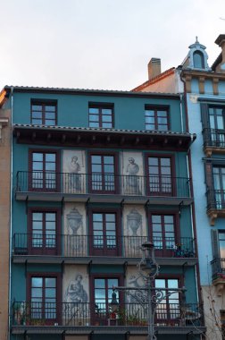 Basque Country: details of the palaces in the Plaza del Castillo, the Castle Square, the nerve centre of the city of Pamplona, stage for bullfights until 1844 and meeting place for locals clipart