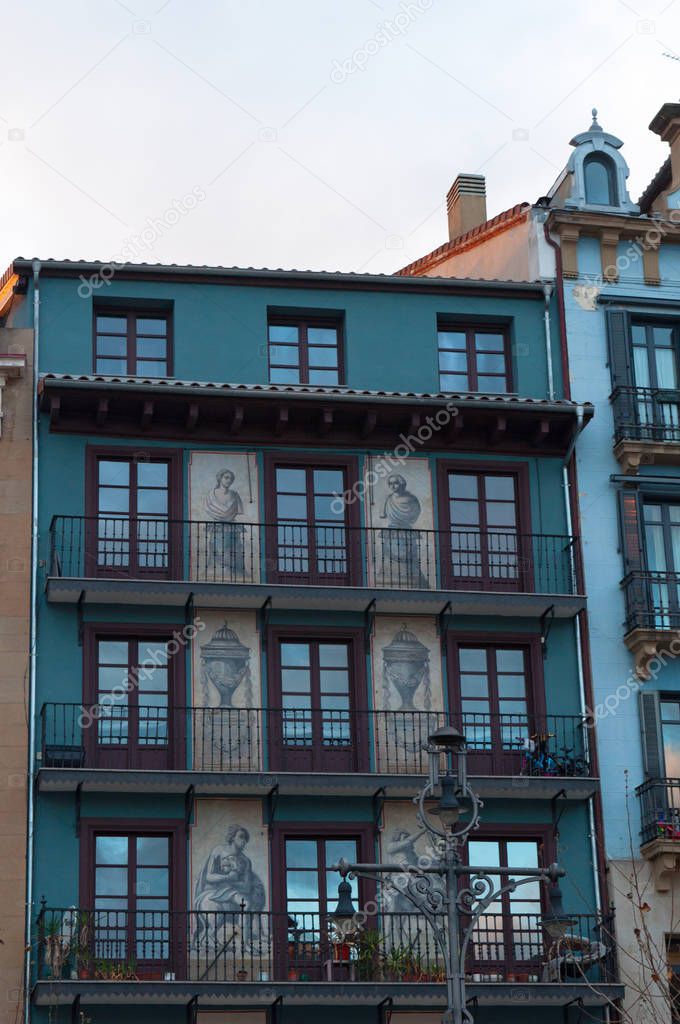 Basque Country: details of the palaces in the Plaza del Castillo, the Castle Square, the nerve centre of the city of Pamplona, stage for bullfights until 1844 and meeting place for locals