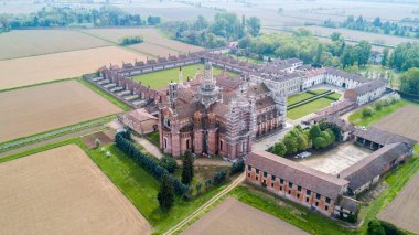 Aerial view of the Certosa di Pavia, built in the late fourteenth century, courts and the cloister of the monastery and shrine in the province of Pavia, Lombardia, Italy clipart