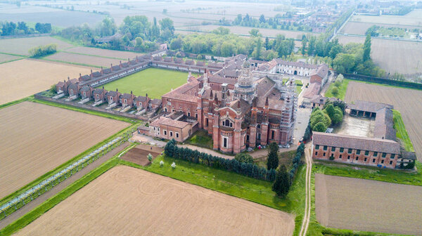 Aerial view of the Certosa di Pavia, built in the late fourteenth century, courts and the cloister of the monastery and shrine in the province of Pavia, Lombardia, Italy