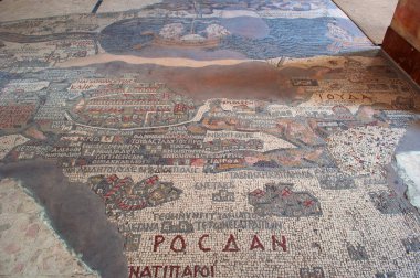 Madaba, Jordan: the Madaba Mosaic Map, a map with hills, valleys and towns in Palestine and the Nile Delta dating from the 6th century on the floor of the Greek Orthodox Basilica of Saint George clipart