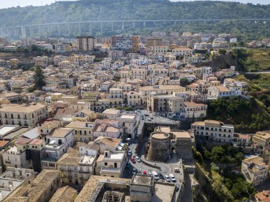 Aerial view of Pizzo Calabro, pier, castle, Calabria, tourism Italy. Panoramic view of the small town of Pizzo Calabro by the sea. Houses on the rock. On the cliff stands the Aragonese castle clipart